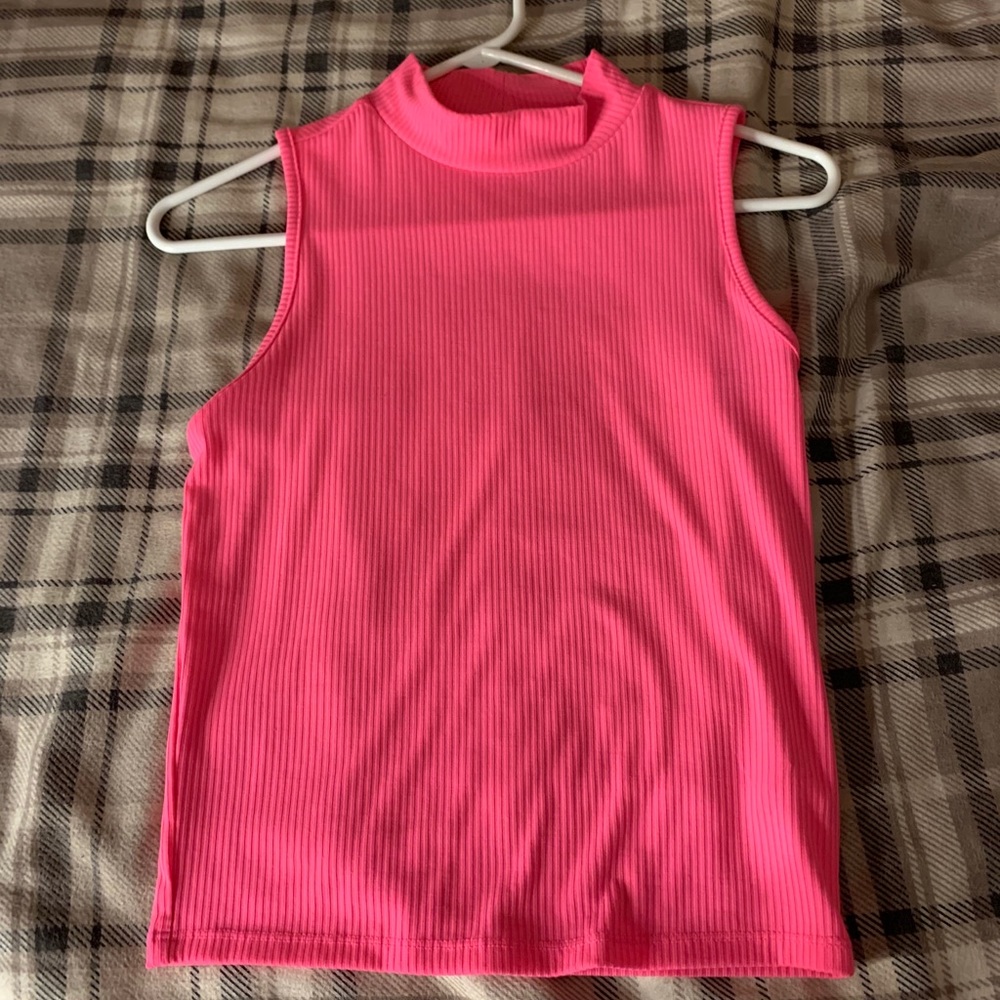 Pink, tank top/crop top. No boundaries.